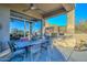 Outdoor patio with seating, built-in grill, and mountain views at 12657 N 135Th St, Scottsdale, AZ 85259