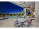 Outdoor patio with seating area, pool view, and sunset in background at 12657 N 135Th St, Scottsdale, AZ 85259