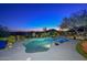 Freeform pool and spa surrounded by desert landscaping with mountain views at 12657 N 135Th St, Scottsdale, AZ 85259