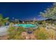 Inviting freeform pool with a mountain view and beautiful desert landscaping at 12657 N 135Th St, Scottsdale, AZ 85259