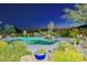 Inviting swimming pool surrounded by desert landscaping at 12657 N 135Th St, Scottsdale, AZ 85259