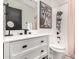 Modern bathroom with white vanity and subway tile at 13235 N 24Th Ave, Phoenix, AZ 85029