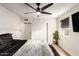 Relaxing bedroom with gray bedding and ceiling fan at 13235 N 24Th Ave, Phoenix, AZ 85029