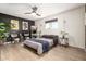 Spacious bedroom with a comfortable bed and dark accent wall at 13235 N 24Th Ave, Phoenix, AZ 85029