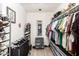 Large walk-in closet with ample shelving and hanging space at 13235 N 24Th Ave, Phoenix, AZ 85029