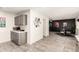 Modern kitchen with gray cabinets and quartz countertops at 13235 N 24Th Ave, Phoenix, AZ 85029