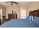 Spacious bedroom with a king-size bed and a large dresser at 1367 S Country Club Dr # 1024, Mesa, AZ 85210