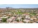 Aerial showing community, landscape, and golf course views at 1604 E Sheena Dr, Phoenix, AZ 85022