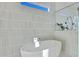 Freestanding tub with modern tile surround at 1604 E Sheena Dr, Phoenix, AZ 85022