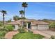 Beautiful one-story home with a two-car garage and desert landscaping at 1604 E Sheena Dr, Phoenix, AZ 85022