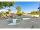 Inviting backyard pool and spa with a spacious patio area at 1604 E Sheena Dr, Phoenix, AZ 85022