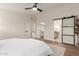 Main bedroom with ensuite bathroom and sliding barn door at 16446 N 56Th Way, Scottsdale, AZ 85254