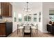 Kitchen dining area with bay window and seating for four at 16446 N 56Th Way, Scottsdale, AZ 85254