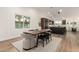 Modern dining room with wood table and black chairs at 16446 N 56Th Way, Scottsdale, AZ 85254