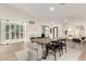 Elegant dining room with a built-in wine storage and hardwood floors at 16446 N 56Th Way, Scottsdale, AZ 85254