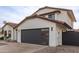 Garage and gated entry with paver driveway at 16446 N 56Th Way, Scottsdale, AZ 85254