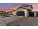 Two-car garage with paver driveway and gated entry at 16446 N 56Th Way, Scottsdale, AZ 85254