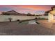 Relaxing kidney shaped pool and grassy backyard at 16446 N 56Th Way, Scottsdale, AZ 85254