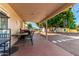 Covered patio with seating area and a view of the backyard at 1724 W 15Th Ave, Apache Junction, AZ 85120