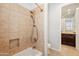 Bathroom with shower and tub, view into another room at 1805 W Parnell Dr, Phoenix, AZ 85085