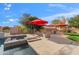 Outdoor kitchen and spa adjacent to the refreshing pool at 1805 W Parnell Dr, Phoenix, AZ 85085