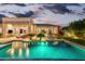 Evening view of a refreshing pool and spa at 1805 W Parnell Dr, Phoenix, AZ 85085