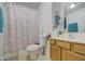 Clean bathroom with a shower/tub combo and double vanity at 1814 S 363Rd Ave, Tonopah, AZ 85354