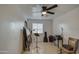 Bedroom with a music setup and a ceiling fan at 1814 S 363Rd Ave, Tonopah, AZ 85354