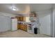 Small kitchen with wood cabinets and white appliances at 1814 S 363Rd Ave, Tonopah, AZ 85354