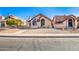 Charming Spanish style home with front yard landscaping at 1841 E Secretariat Dr, Tempe, AZ 85284