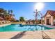 Community pool with lounge chairs and covered seating at 1841 E Secretariat Dr, Tempe, AZ 85284