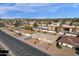 Aerial view showing a single-story house and surrounding neighborhood at 18625 N 103Rd Ave, Sun City, AZ 85373