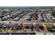 Wide aerial view of a residential neighborhood with houses and streets at 18625 N 103Rd Ave, Sun City, AZ 85373