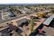 Aerial view of a house and yard, next to a parking lot at 18625 N 103Rd Ave, Sun City, AZ 85373