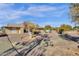 Large backyard with gravel and mature trees at 18625 N 103Rd Ave, Sun City, AZ 85373