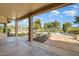 Covered patio overlooks the pool and golf course at 18903 N 87Th Dr, Peoria, AZ 85382