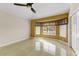 Bright bedroom with tile flooring and bay window at 18903 N 87Th Dr, Peoria, AZ 85382