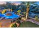 Aerial view of a backyard oasis with a pool and lush landscaping at 19034 N 94Th Way, Scottsdale, AZ 85255