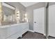 Modern bathroom with dual sinks, ample counter space, and stylish lighting at 19034 N 94Th Way, Scottsdale, AZ 85255