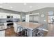 Modern kitchen with stainless steel appliances and large island at 19034 N 94Th Way, Scottsdale, AZ 85255