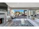 Open living area with glass doors opening to the pool area at 19034 N 94Th Way, Scottsdale, AZ 85255