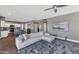 Modern living room with open kitchen and neutral tones at 19034 N 94Th Way, Scottsdale, AZ 85255