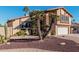 Two-story house with a large garage and desert landscaping at 1918 E Hearn Rd, Phoenix, AZ 85022