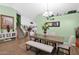 Dining room with a rustic wood table and a chandelier at 19222 N 70Th Ave, Glendale, AZ 85308