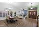 Bright dining area with a wood table and chandelier at 19222 N 70Th Ave, Glendale, AZ 85308