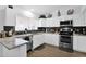 Modern kitchen with granite countertops and stainless steel appliances at 19222 N 70Th Ave, Glendale, AZ 85308