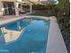 Sparkling blue pool reflecting the home's exterior at 19222 N 70Th Ave, Glendale, AZ 85308