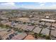 Aerial view of neighborhood with mountain views at 19961 W Heatherbrae Dr, Litchfield Park, AZ 85340