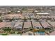 Aerial showing neighborhood homes and pools at 19961 W Heatherbrae Dr, Litchfield Park, AZ 85340