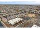 Aerial view of community with shops and homes at 19961 W Heatherbrae Dr, Litchfield Park, AZ 85340